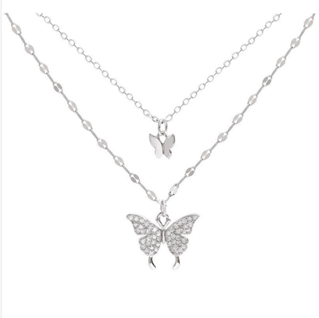 Layering Minimalist Butterfly Necklaces