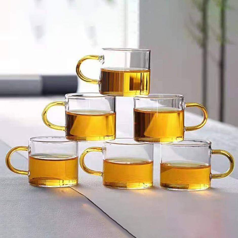 Yellow tea cup with handle