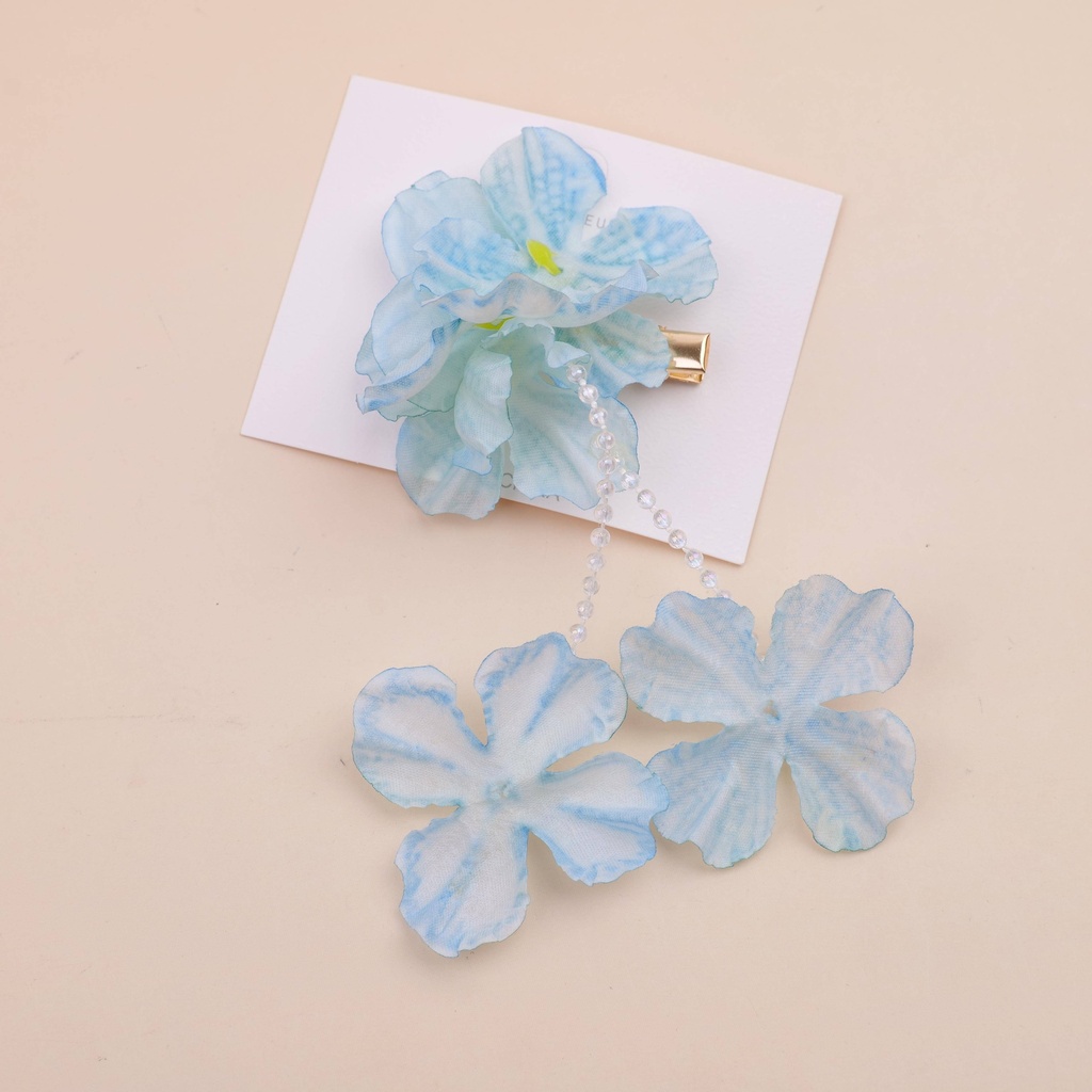 Blue flower press clip