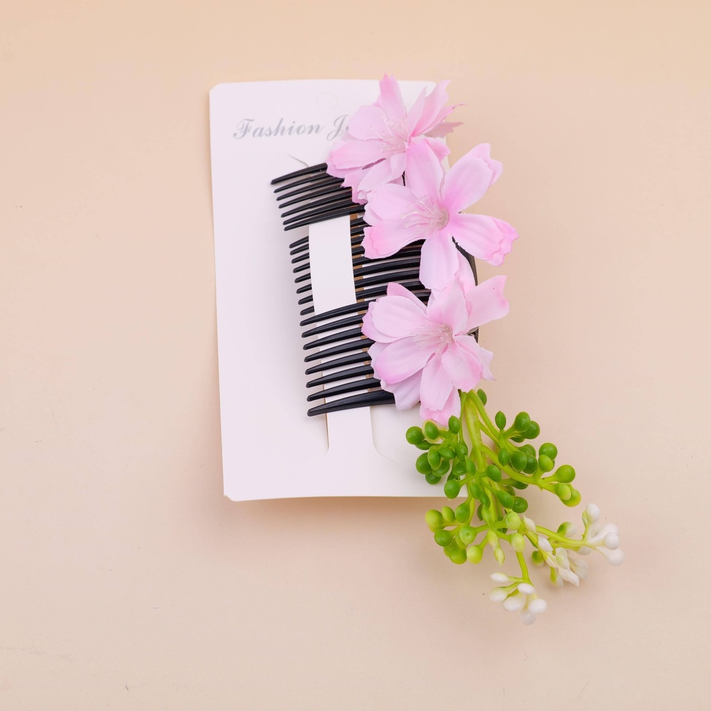 Pink flower comb