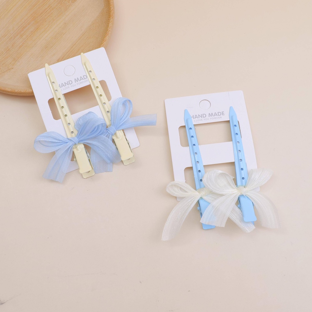 2 pcs of thin silk blue and white bow hair clips
