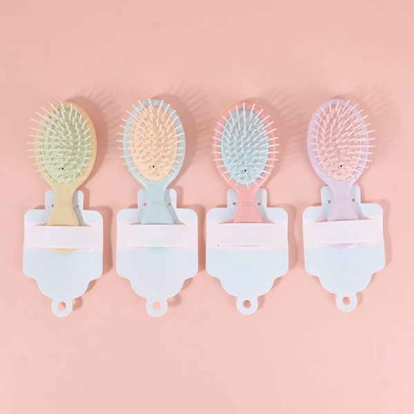 Candy-colored oval airbag comb
